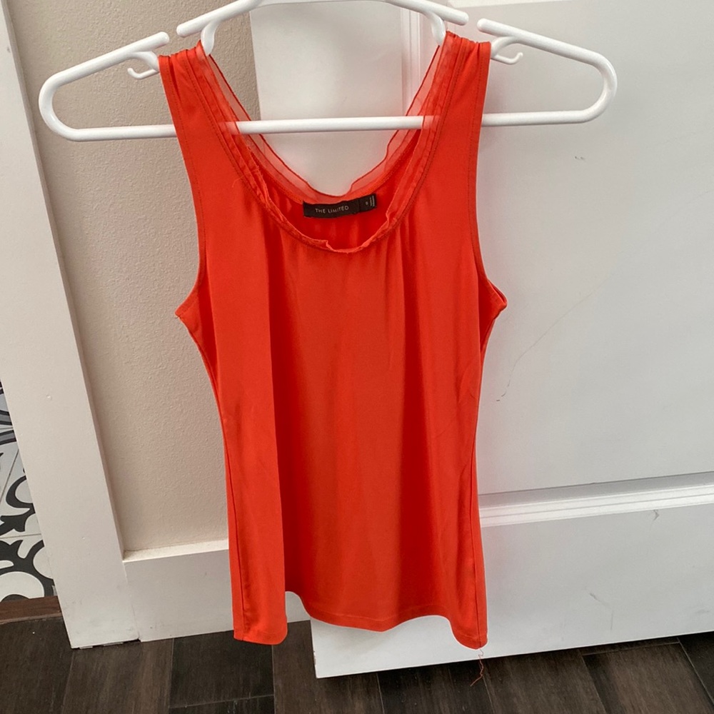 The limited size small orange sleeveless top